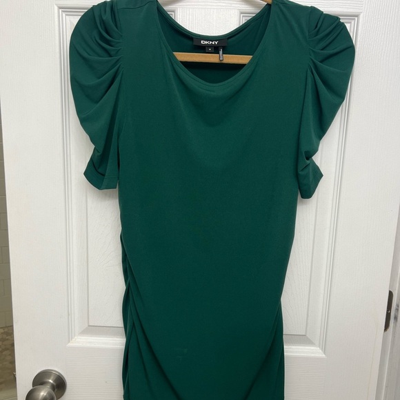 Puff/ruffle sleeve touched top in true emerald green. - Picture 1 of 3